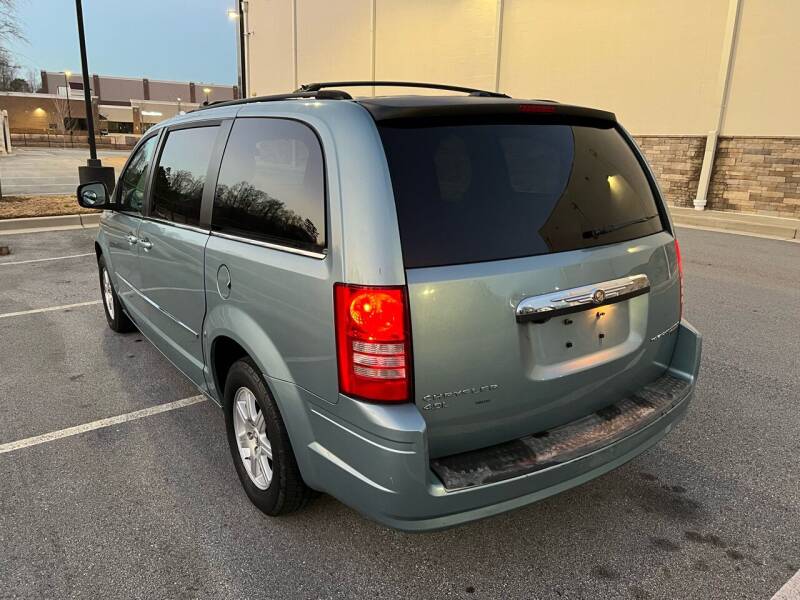 2010-chrysler-town-and-country-touring-plus-4dffr-mini-van